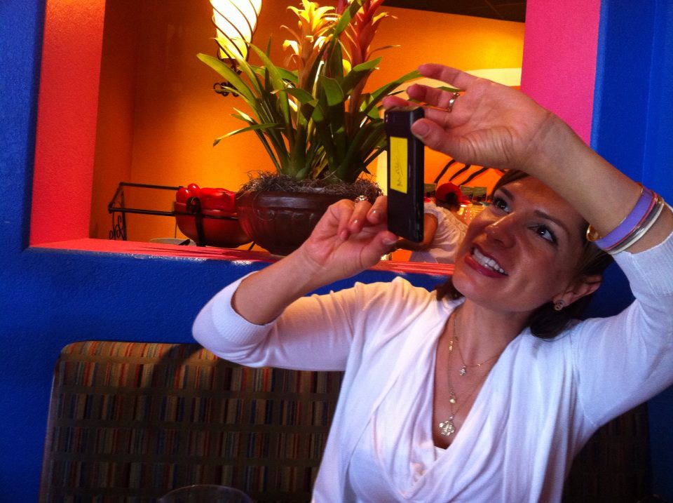 paola pic taking pic with phone, taken my Susie Woodruff at el torito 8-23-13