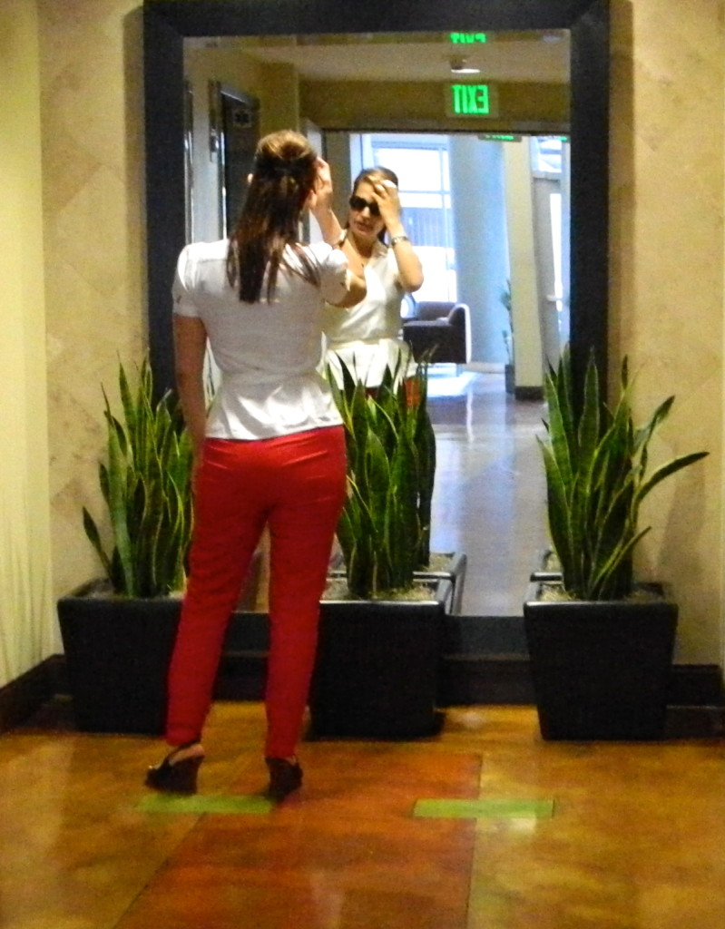 paola pic 5 red pants white top mirror 2